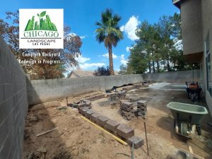 This photo shows construction of retaining walls for the planting beds