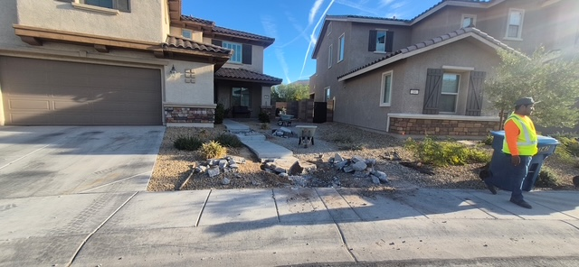 Front yard turf removal in progress, showing the raw subgrade layout prepared for landscape rock installation by Chicago Landscape of Las Vegas.