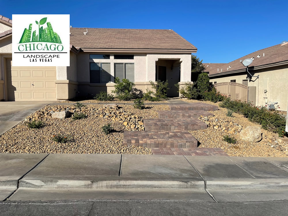 Completed front yard desert landscape conversion in Henderson featuring a custom paver walkway, multi-level steps, and water-smart plants in Anthem.