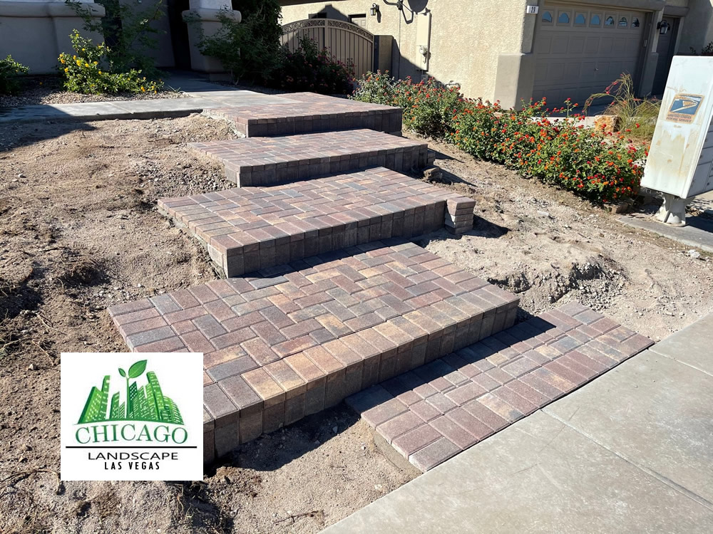Multi-level landscape paver steps being installed in an Anthem front yard.