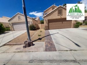 Photo shows paver accent on left side of driveway